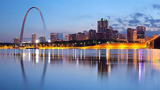 Saint Louis arch and skyline reflecting on the Mississippi river