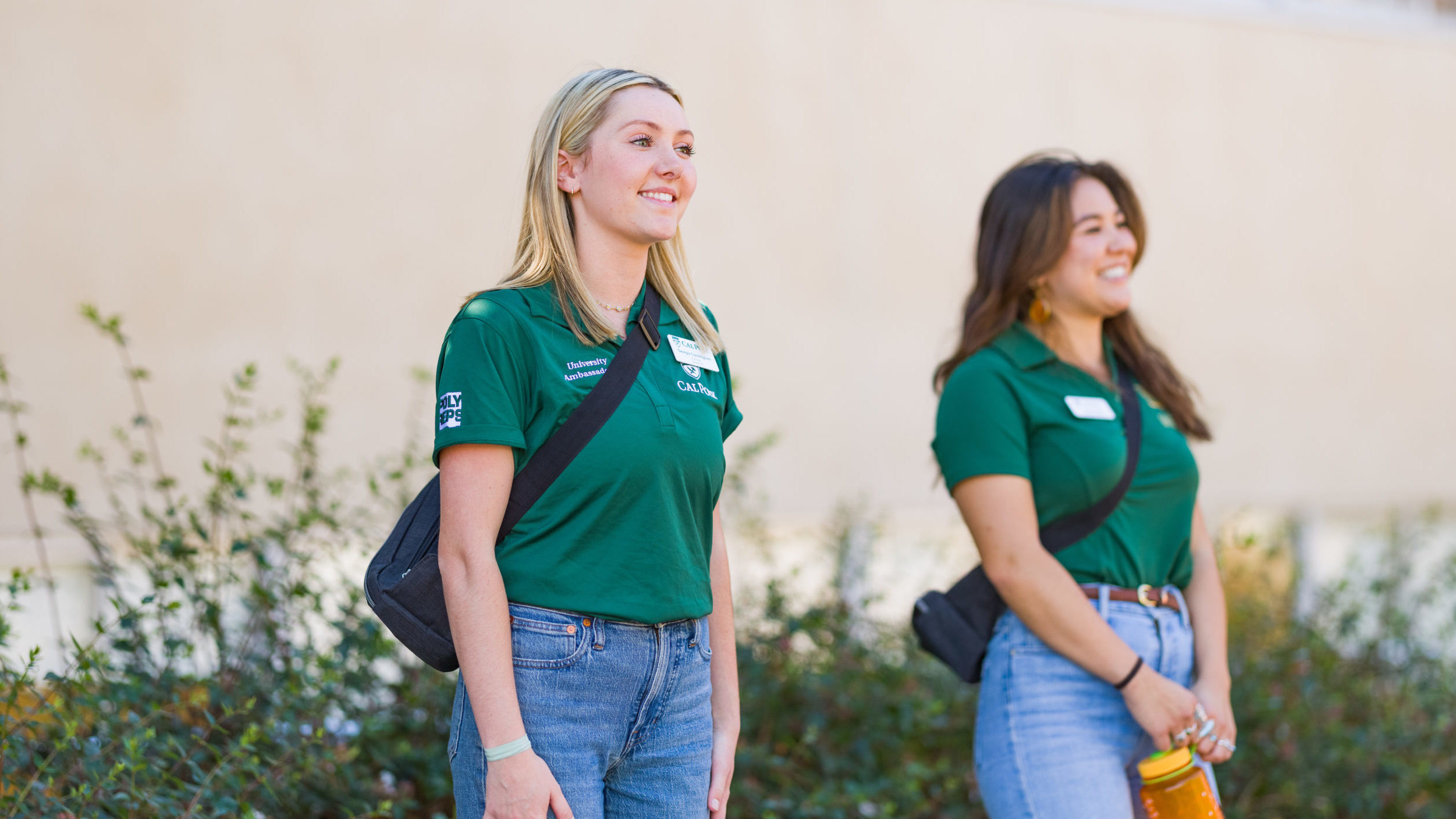 2 female students work as Poly Reps on campus