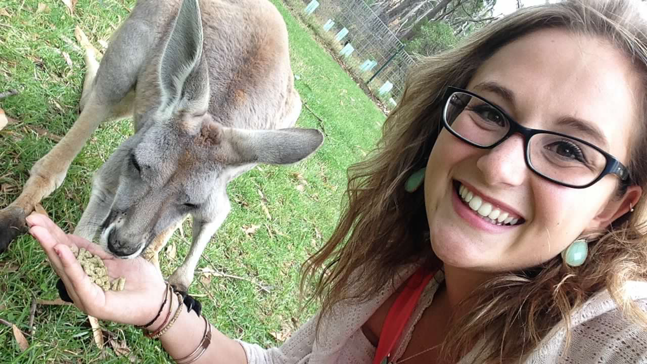 Woman feeding a kangaroo