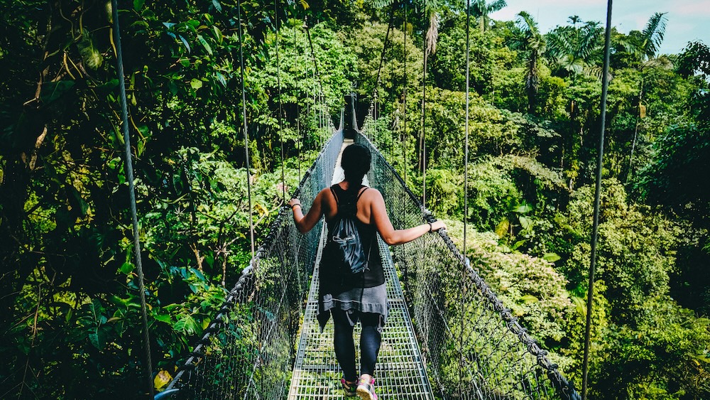 Woman walking on a bridge