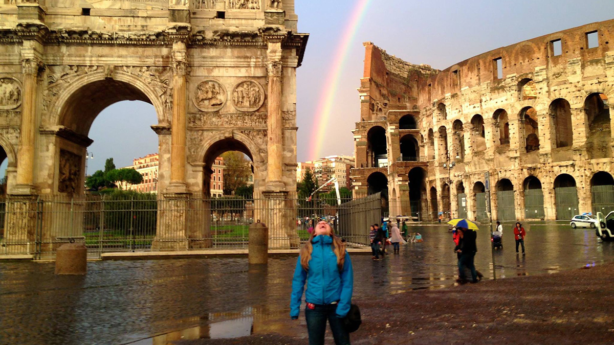 Student with a rainbow in Rome