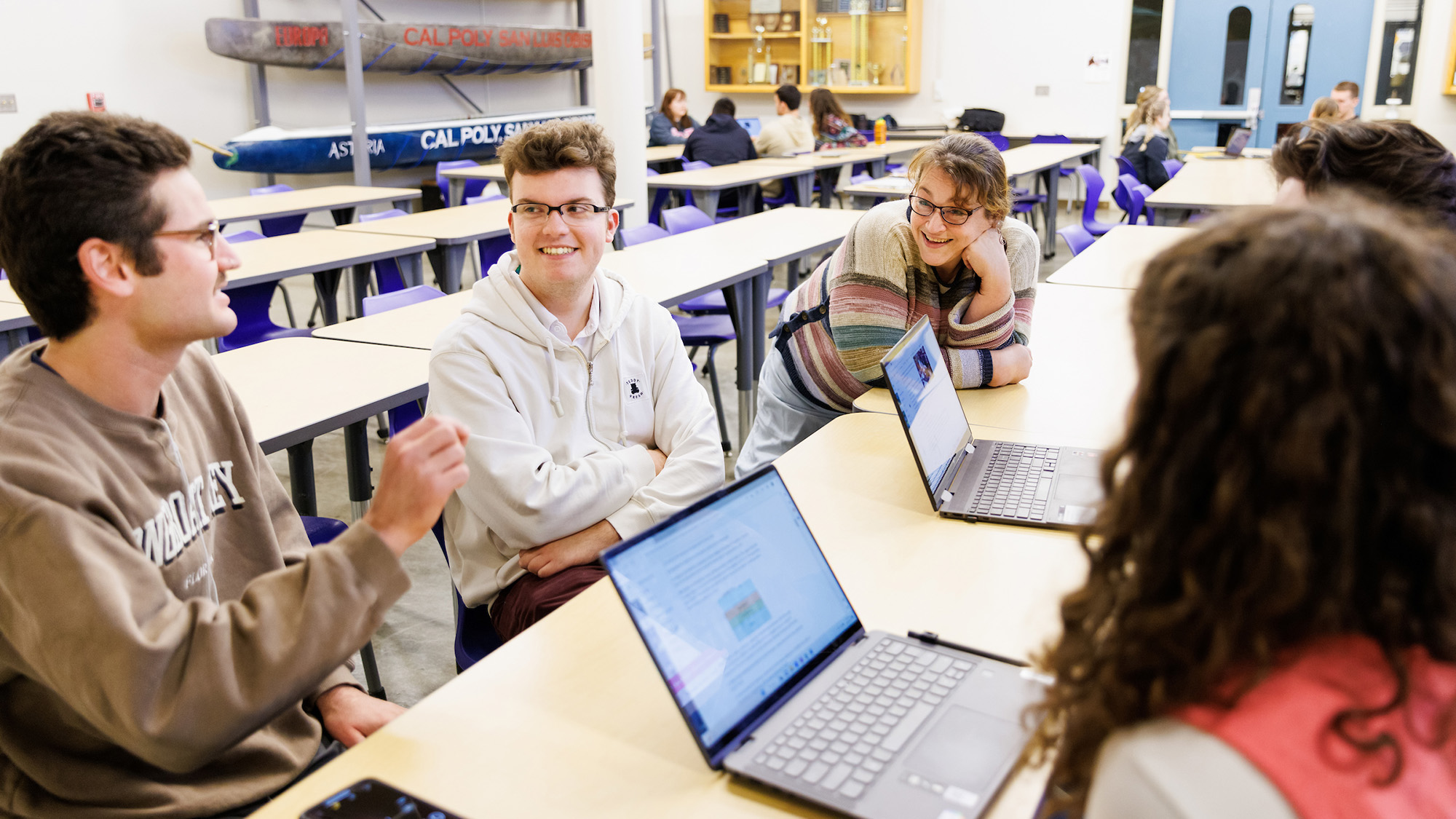 Students sitting at a computer