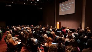 Audience attending CPIC 2026 conference presentation in San Luis Obispo event hall